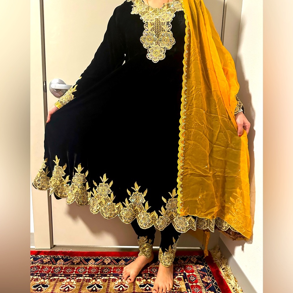 Medium size dress with black and gold color beautiful design for every occasion